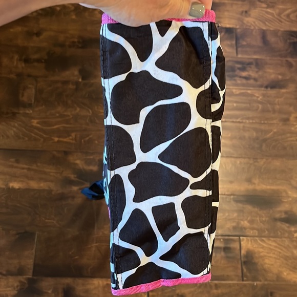 Zebra print bag. Black with pink handle and trim. Used several times. - Picture 2 of 7